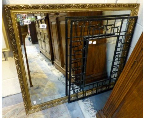 Large bevelled edged gilt framed mirror and iron framed other example with stick figure