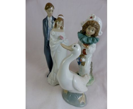 Three NAO figurines duck,bride and clown