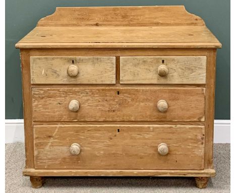 VICTORIAN STRIPPED PINE RAILBACK CHEST - of two short and two long drawers with turned wooden knobs on turned bun feet, 95cms