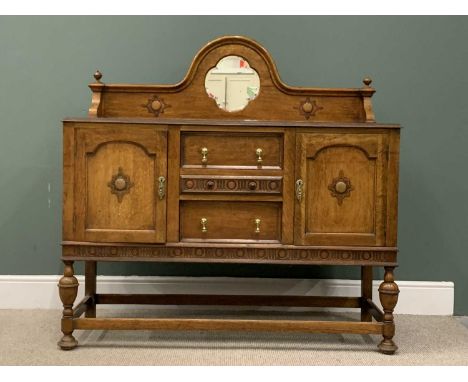 EDWARDIAN OAK SIDEBOARD - with mirrored railback and sunburst type carvings, three drawers flanked by two cupboard doors, on 
