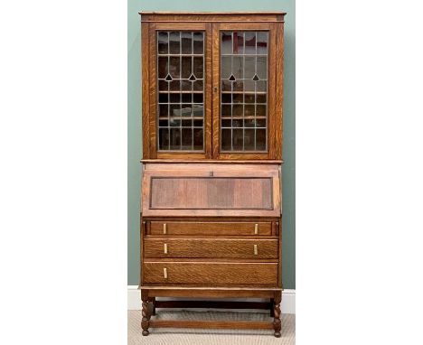 VINTAGE OAK BUREAU BOOKCASE - the upper section having twin leaded glazed doors with Arts &amp; Crafts style pattern, over a 