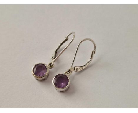 A pair of boxed white gold amethyst drop earrings 9ct 1.9 gms