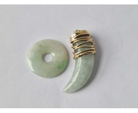 A gold mounted jade pendant and disk 9ct