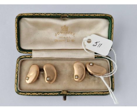 A boxed pair of kidney bean pearl set cufflinks 9ct 6.8 gms