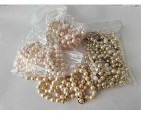 A bag of assorted pearl necklaces