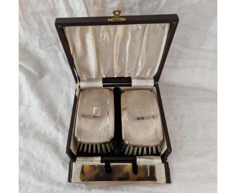 A pair of boxed hair brushes and a comb, Birmingham 1947