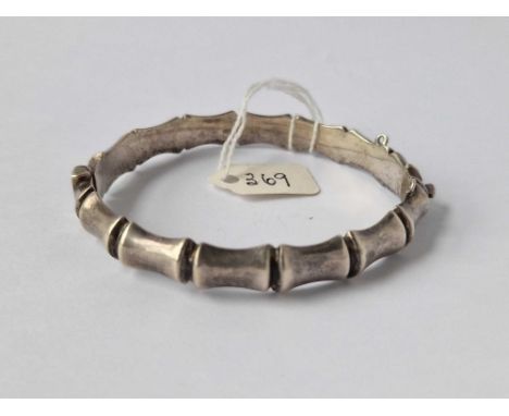 A vintage 1962 silver bamboo bangle