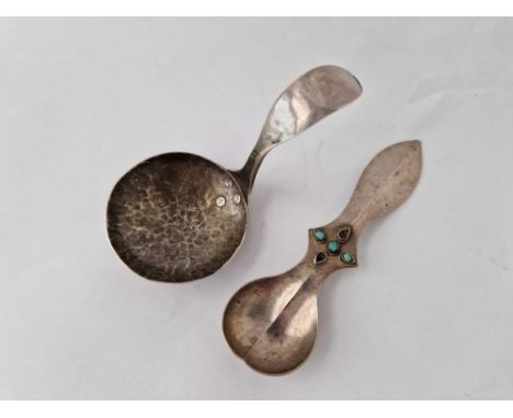 A caddy spoon with hammered bowl and an eastern spoon inset with turquoise