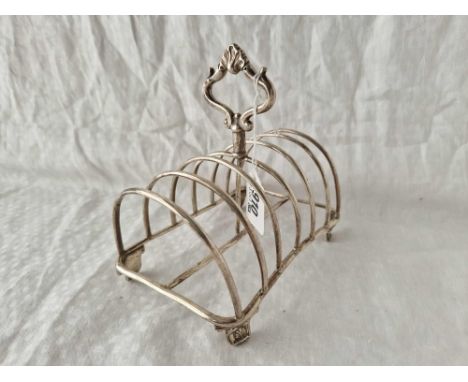 William IV toast rack on four shell bracket feet.. Birmingham 1935. 250gms
