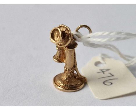 A candle stick phone charm 9ct 3.2 gms