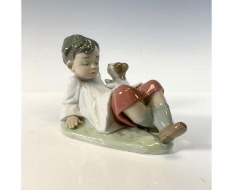 Glossy finish; Lladro backstamp. This item comes with original box which measures 8"L x 5.5"W x 5"H. Artist signed.Artist: An
