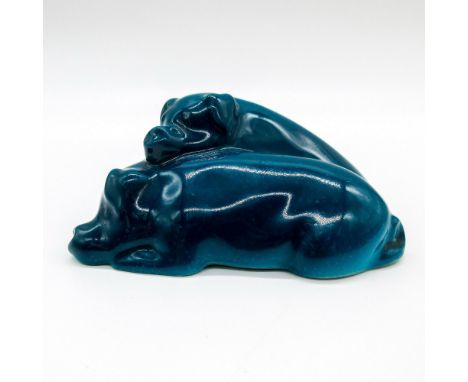 Model No.62. A glossy bone china animal figure of two sleeping pigs with both ears down, in turquoise color variation.Royal D