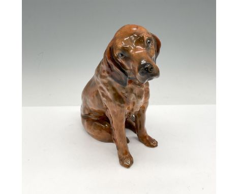 Light brown coat, floppy ears and bushy tail. Royal Doulton backstamp. Issued: 1930 - 1946Dimensions: 7"L x 3.5"W x 6.5"HManu