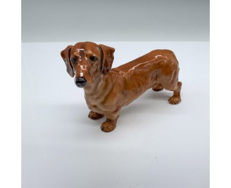 Glossy light brown finish; Royal Doulton backstamp. Artist: Frederick DawsIssued: 1937-1968Dimensions: 6"L x 2"W x 4"HManufac