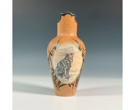 Decorated with pate-sur-pate birds, and two white beaded cartouches featuring a dog and a rabbit. Doulton Lambeth impressed s