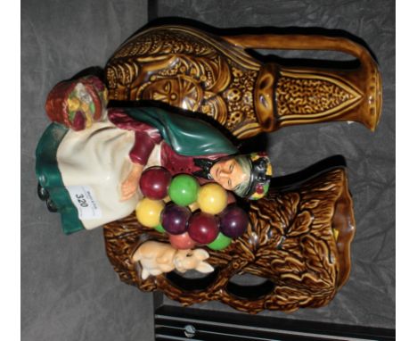 *A Royal Doulton figure - The Old Balloon Seller HN1315, a Sadler Inca style ewer and a Sylvac jug in the form of a rabbit un