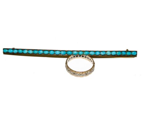 A two colour paste set eternity ring and a long bar brooch set with turquoise stones