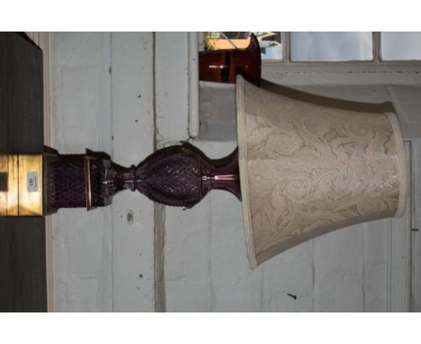 A purple glass diamond cut  table lamp in the early 19th Century style, of baluster form with square base, 44cm high