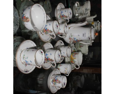 A Tuscan China plant pattern coffee set with six coffee cans and saucers, and other similar teawares