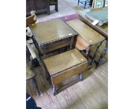 An oak gateleg table with frieze drawer on turned and block legs joined by stretchers, 58cm wide, an oak stool with drop leav