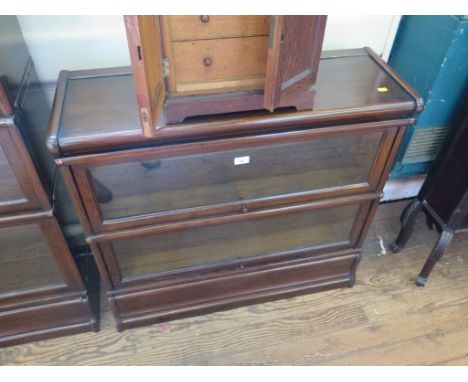 A Globe Wernicke two tier oak stacking bookcase, with glazed fall fronts, 86cm wide, 80cm high