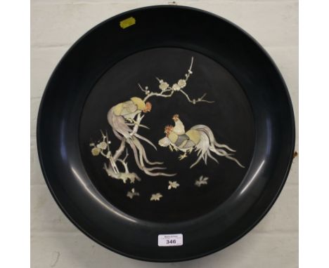 A Chinese lacquered papier mache charger depicting cockerals in mother of pearl, 39cm diameter