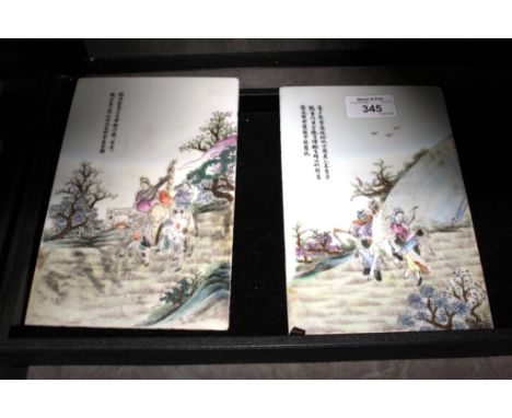 A pair of Chinese porcelain plaques, one depicting a lady lute player on horseback with assistant, the other a lady archer wi