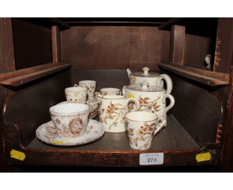 An Aynsley and Co commemorative cup and saucer celebrating the longest reign of Queen Victoria, and an Oriental ivory ware te