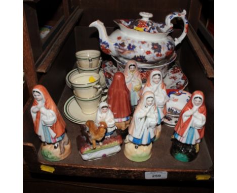 Seven Red Riding Hood figures, a Amherst Japan pattern teapot, slop bowl, square dish and a set of four Royal Cauldon coffee 