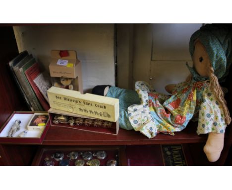 A Steiff Winnie the Pooh ornament, no.680113 limited edition for 2001, a rag doll, a Britian's model of 'Her Majesty's State 