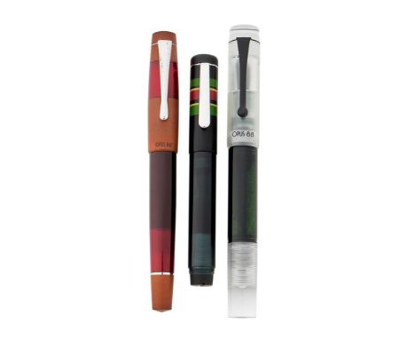
	
		OPUS 88, THREE FOUNTAIN PENS
		
		KOLORO RED
		Cap and Barrel: Red and brown resin
		Nib and Filling System: Broad steel