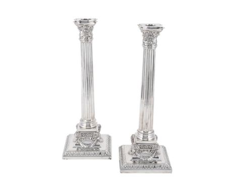 
	
		A PAIR OF VICTORIAN SILVER CORINTHIAN CANDLESTICKS
		MARTIN, HALL &amp; CO., LONDON 1888
		With shaped square sconces, f