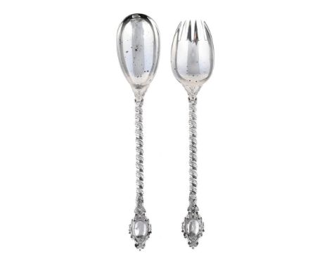 
	
		A PAIR OF VICTORIAN SILVER SALAD SERVERS
		FRANCIS HIGGINS II, LONDON 1867
		With cable twist stems, engraved with a cor