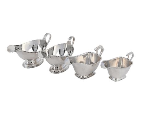 
	
		A PAIR OF SILVER OVAL SAUCE BOATS
		COLLINGWOOD &amp; CO., LONDON 1932
		With reeded borders, loop handles and on oval m