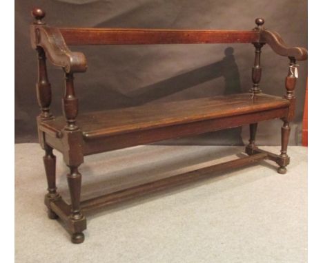 An antique oak bench 
