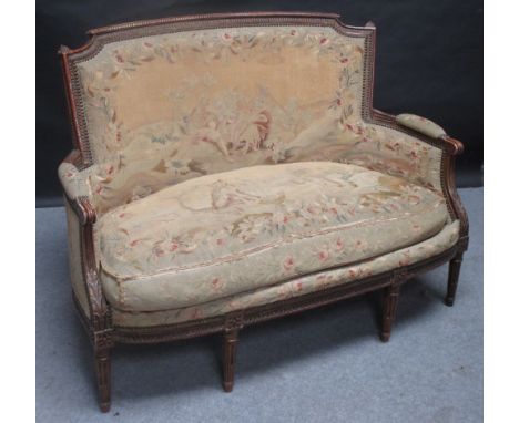 A tapestry upholstered settee 