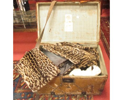 A 19th century pony skin trunk with maker's label to inside of lid 