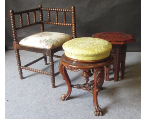 A Victorian walnut piano stool, together with a bobbin turned corner chair, a reproduction stool and an Indian octagonal occa