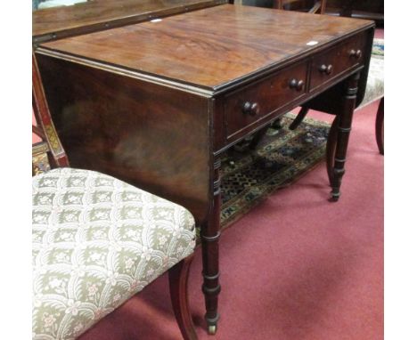 A 19th century mahogany sofa table in the manner of Gillow 