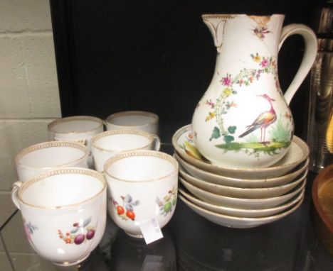 A set of six Meissen floral coffee cups and saucers together with a jug 