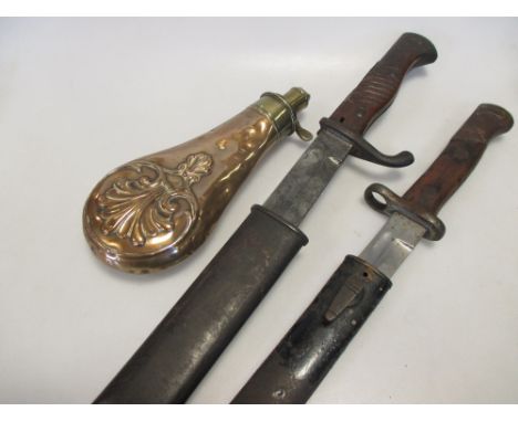 Three rifle bayonets and a brass powder flask (3) 