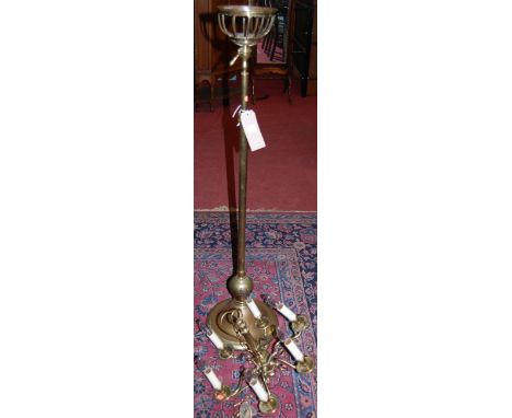 A Victorian brass telescopic paraffin lamp stand (lacking paraffin burner), together with a brass hanging six light electroli