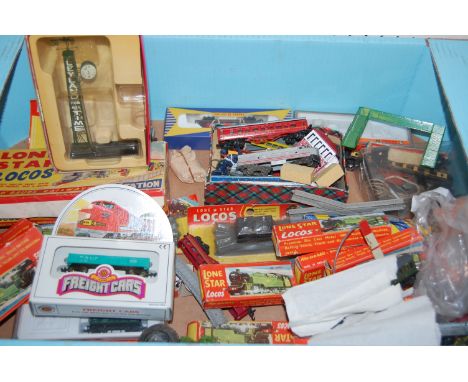 A box of mixed small scale locomotives, rolling stock and accessories to include; Lone Star 000 electric, Lone Star locos and