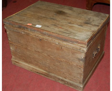 A 19th century pine hinge topped tool chest with end carry handles