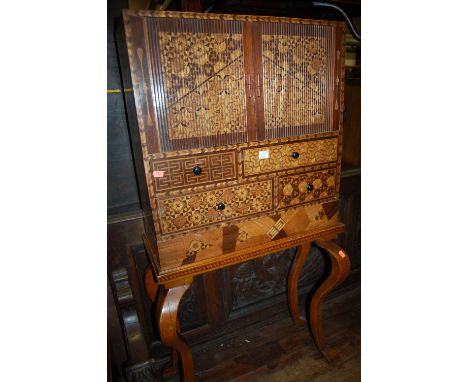 A Japanese specimen wood cabinet on stand 