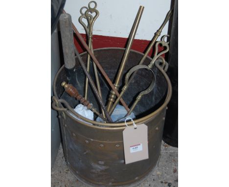 A brass swing carry handle coal bucket with various fire tools etc 