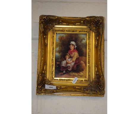 Reproduction oleograph study of a girl in rural setting, gilt framed
