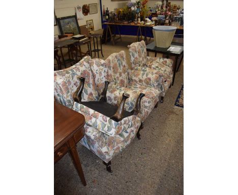 Pair of early 20th century floral upholstered armchairs together with a further similarly upholstered wing back chair with st