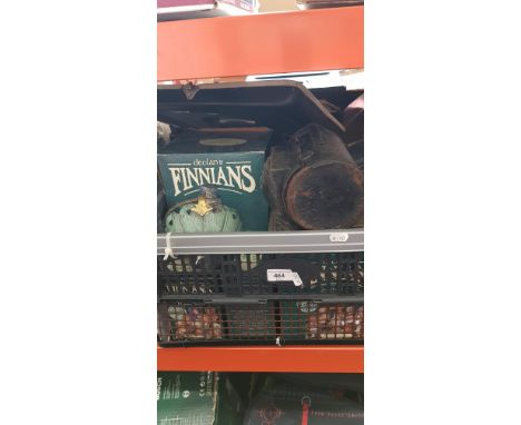 A box of misc. items including a brass clock face, a railway lamp, Irish novelty figures, etc. 