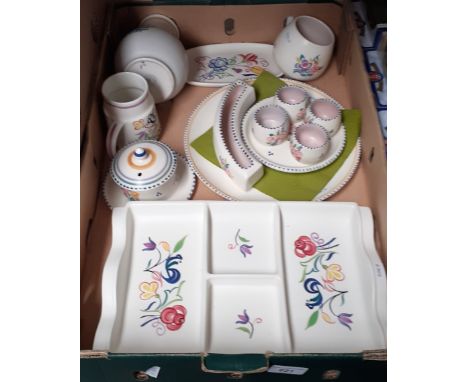 Thirteen pieces of Poole pottery. 